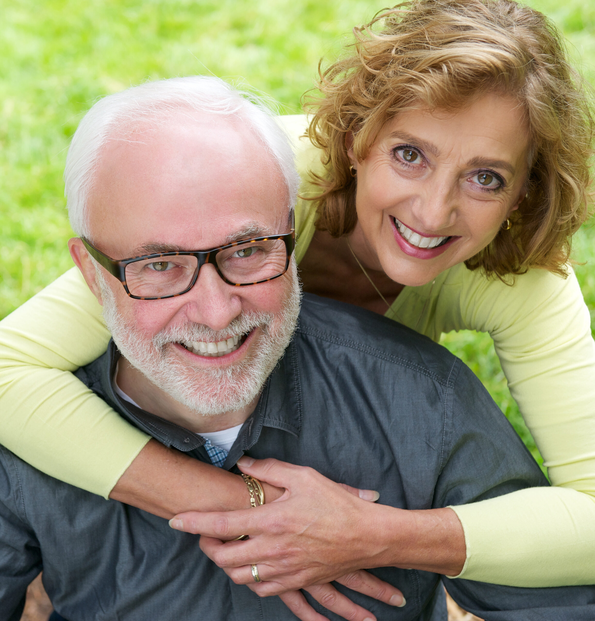 Portrait of a senior couple smiling together outdoors